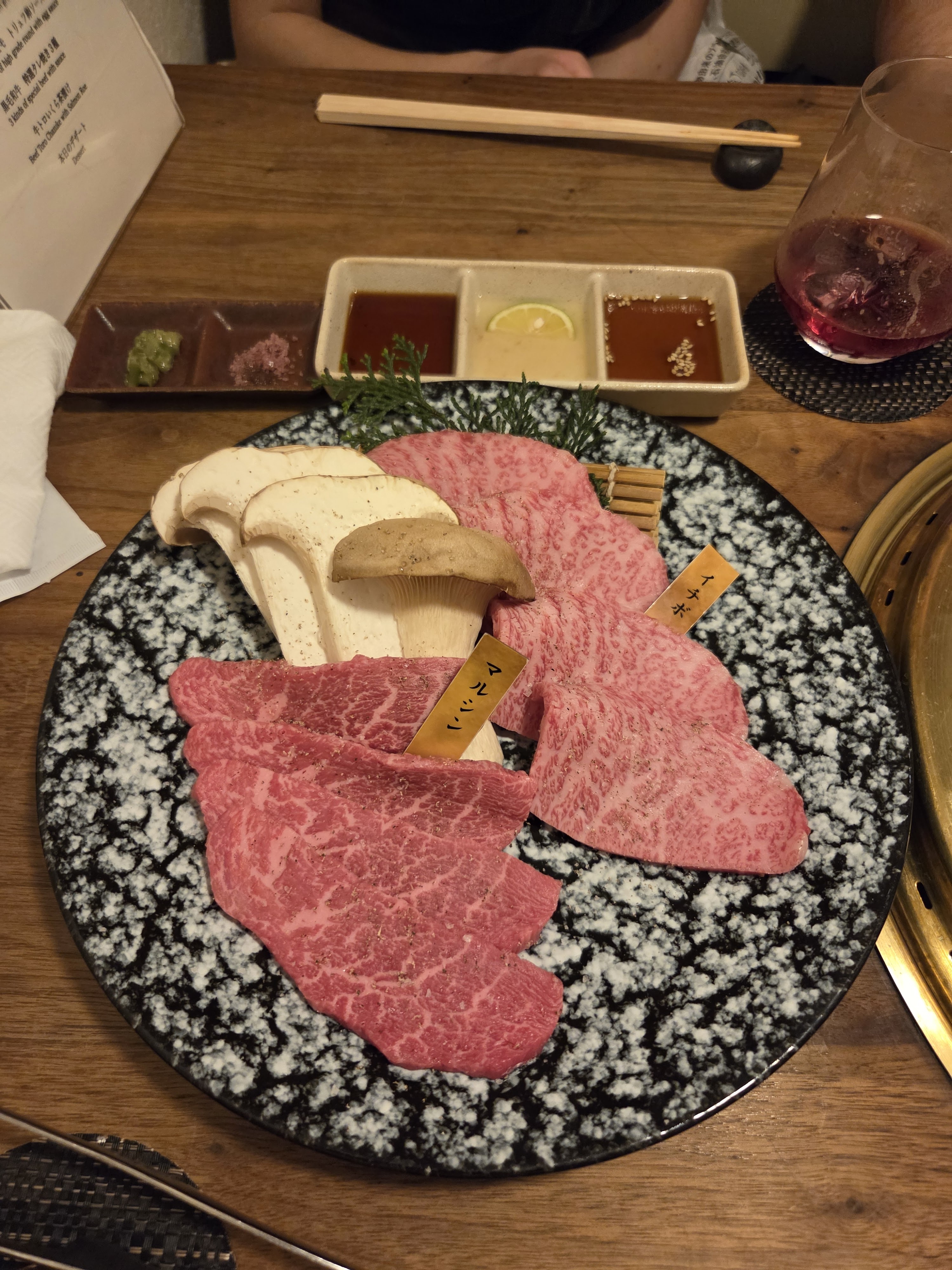 Marbled wagyu and mushrooms ready for the yakiniku grill