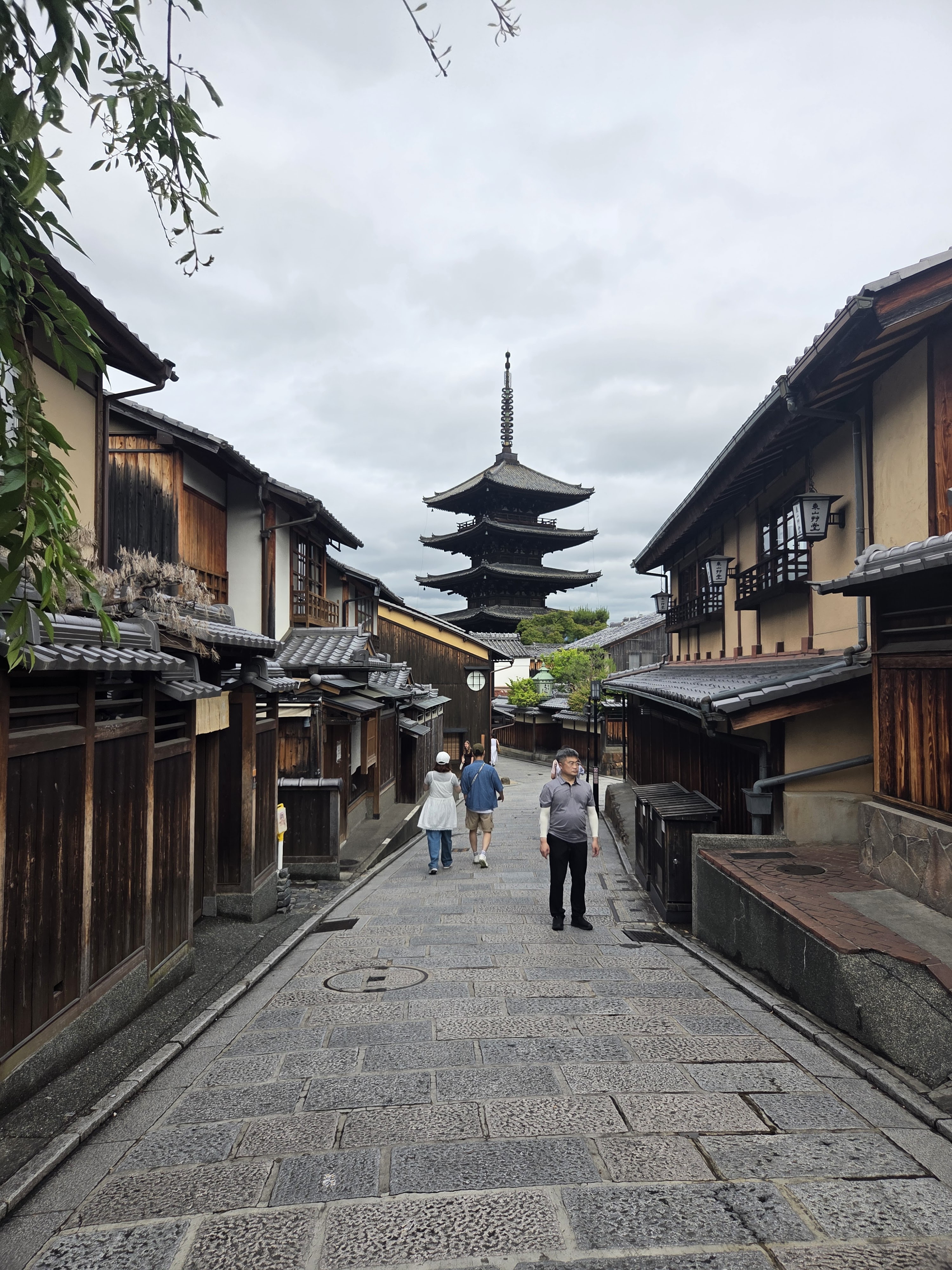 A narrow Kyoto street framed by Yasaka Pagoda
